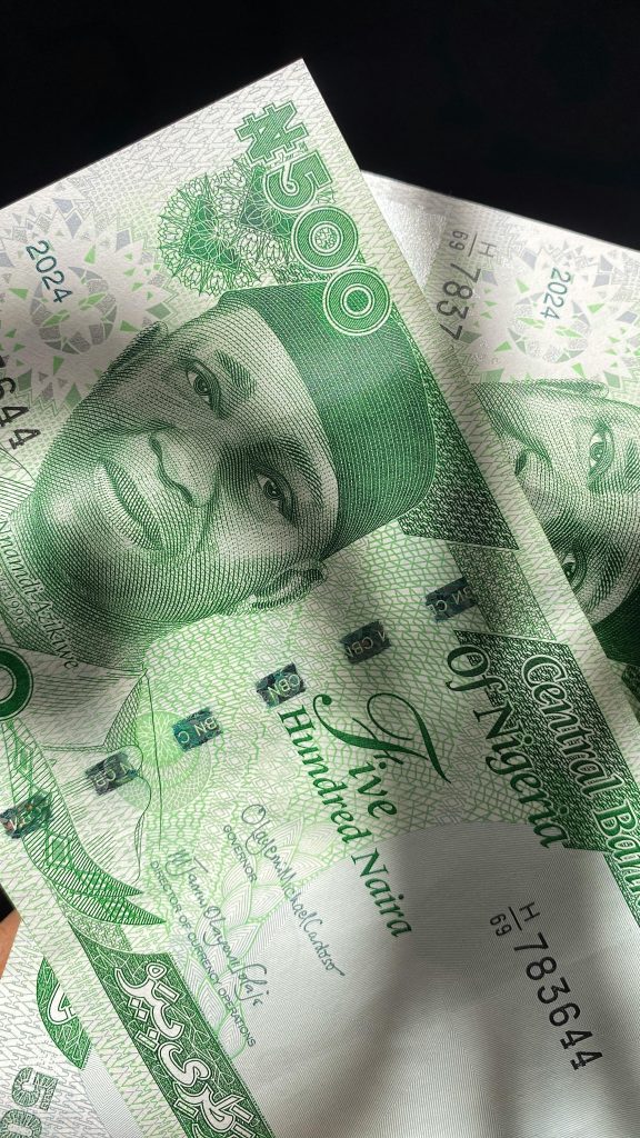 Close-up of Nigerian ₦500 naira notes showcasing detailed design and currency features.